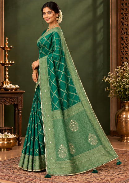 Samrudhi silk saree in vibrant combination of emerald green and lime green with a lustrous Banarasi silk finish.