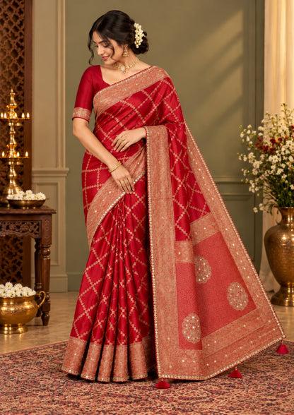 Samrudhi Silk saree in vibrant crimson red with a shimmering copper-toned border.