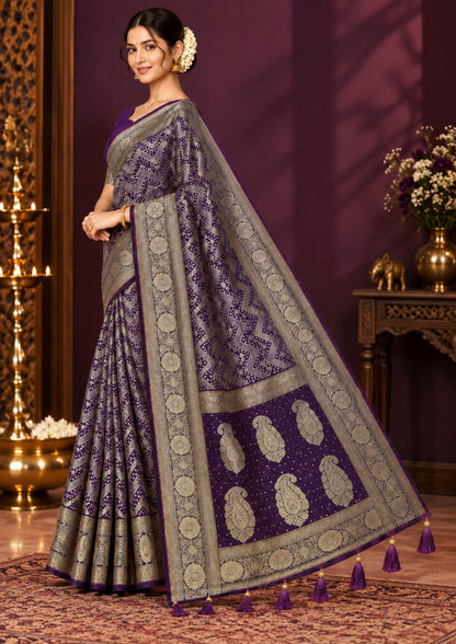 Tarani Silk saree in royal deep purple shade with a rich golden zari weave.