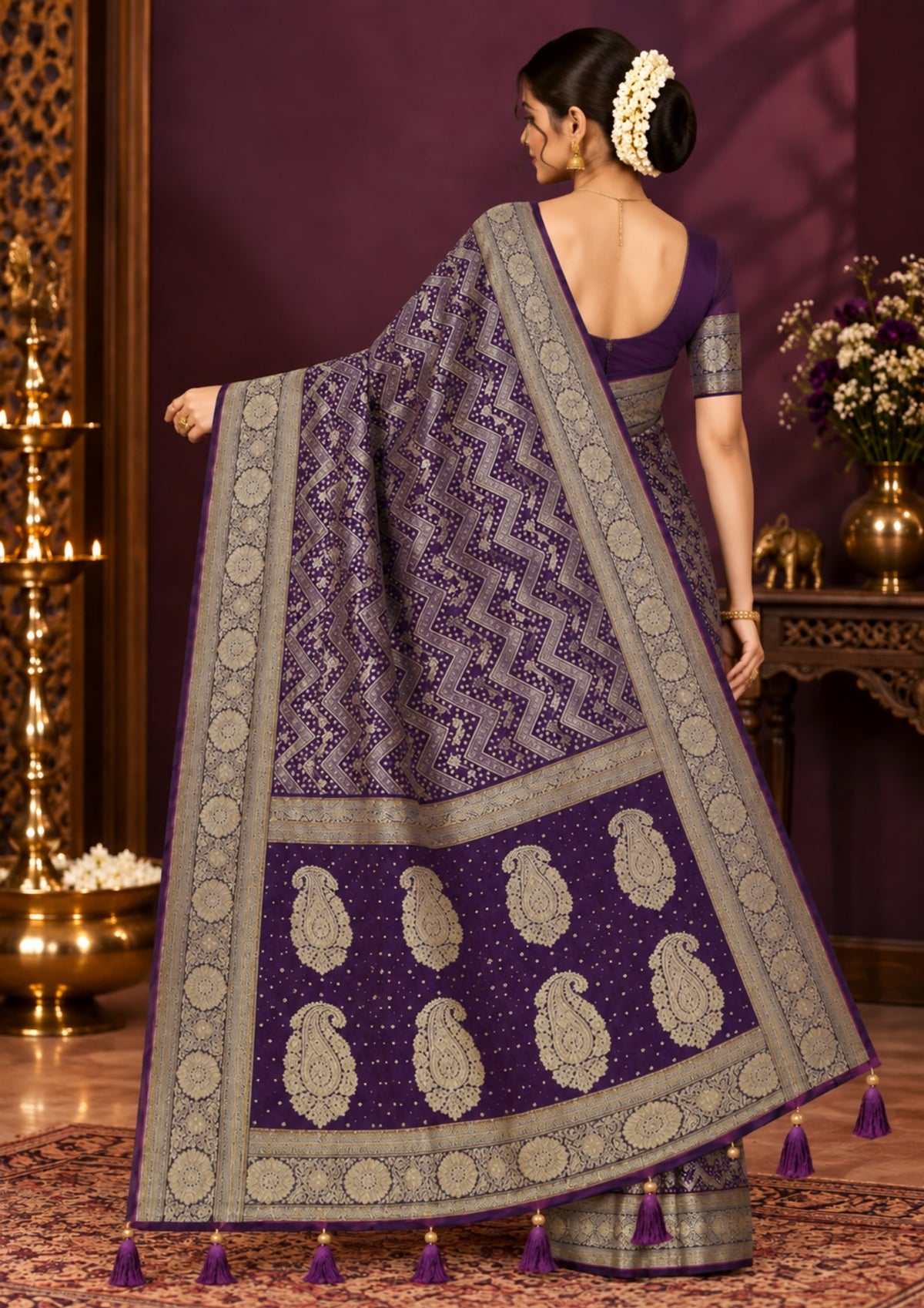 Tarani Silk saree in royal deep purple shade with a rich golden zari weave.