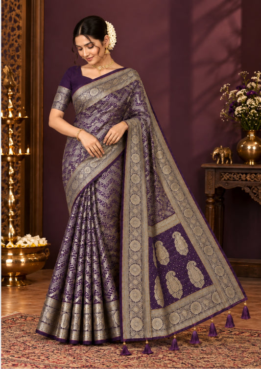 Tarani Silk saree in royal deep purple shade with a rich golden zari weave.