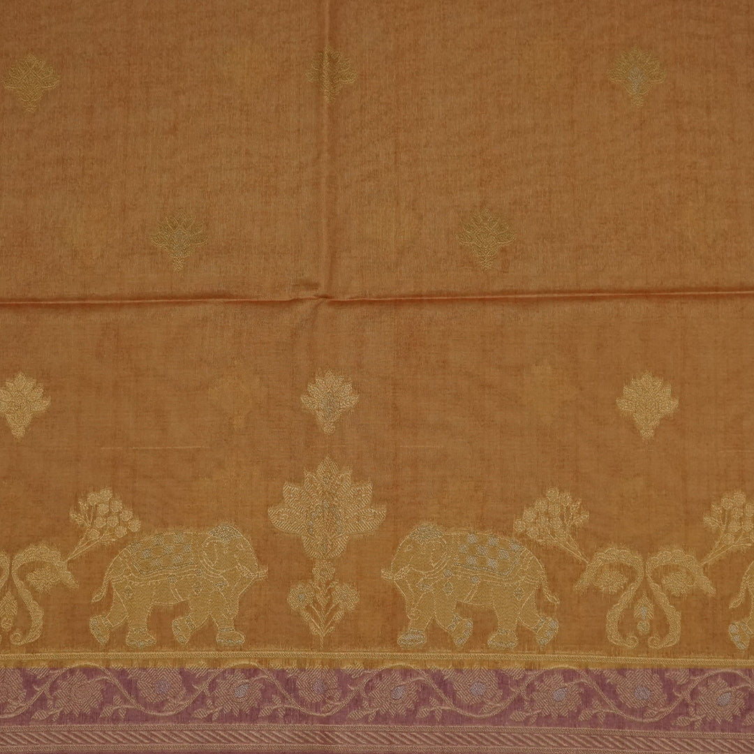 Golden Amber Ambari Silk Tussar with Dusky Mauve border and Zari works.