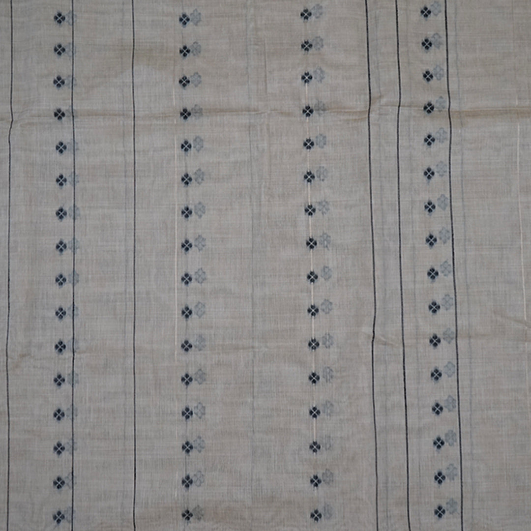 Beige Ishvani Tussar saree with black tassels