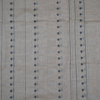 Beige Ishvani Tussar saree with black tassels