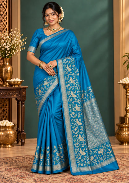 Hamsini Silk saree in Vibrant teal blue shade with a lustrous silk texture.
