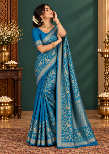 Hamsini Silk saree in Vibrant teal blue shade with a lustrous silk texture.