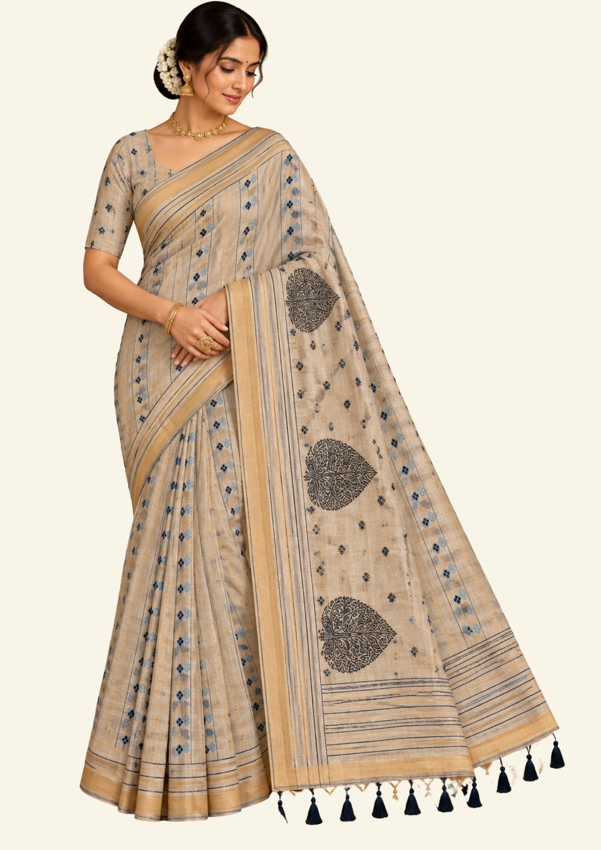 Beige Ishvani Tussar saree with black tassels