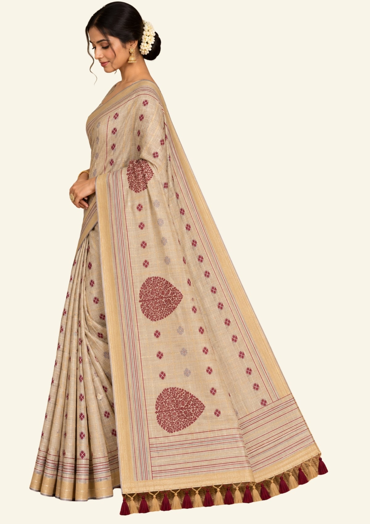 Beige Ishvani Tussar saree with Maroon tassels