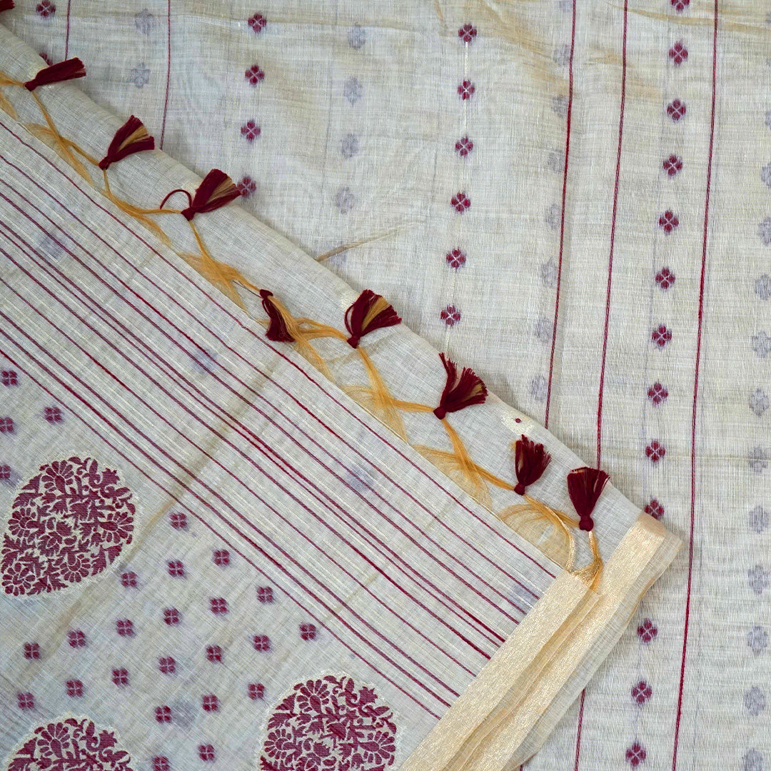 Beige Ishvani Tussar saree with Maroon tassels