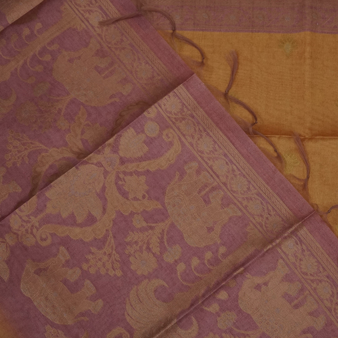 Golden Amber Ambari Silk Tussar with Dusky Mauve border and Zari works.