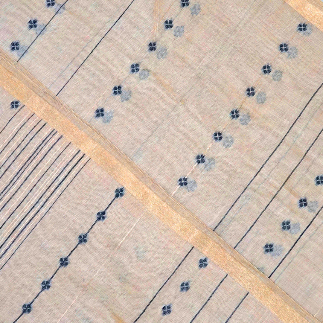 Beige Ishvani Tussar saree with black tassels