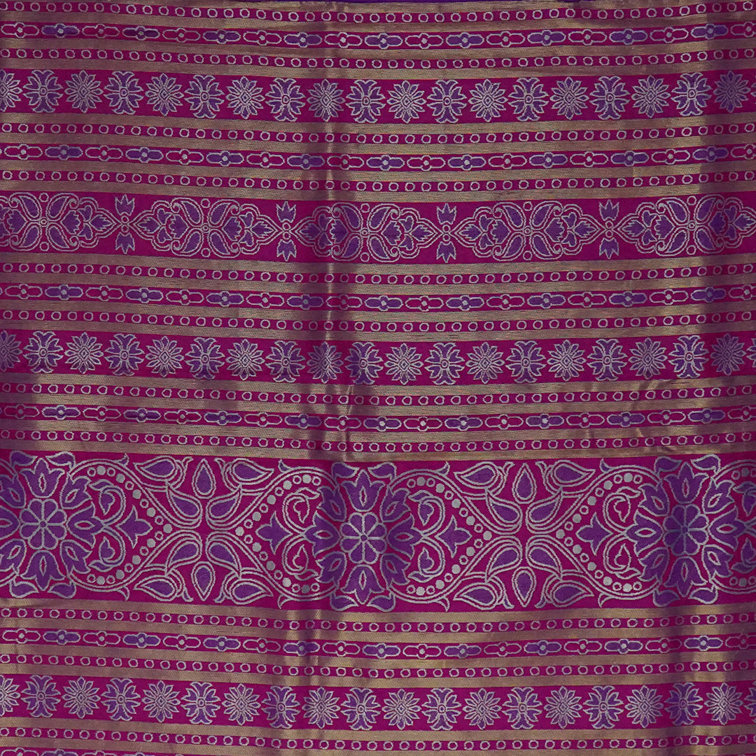 Magenta Stravi Silk Saree with lavender pall and Gold Zari.