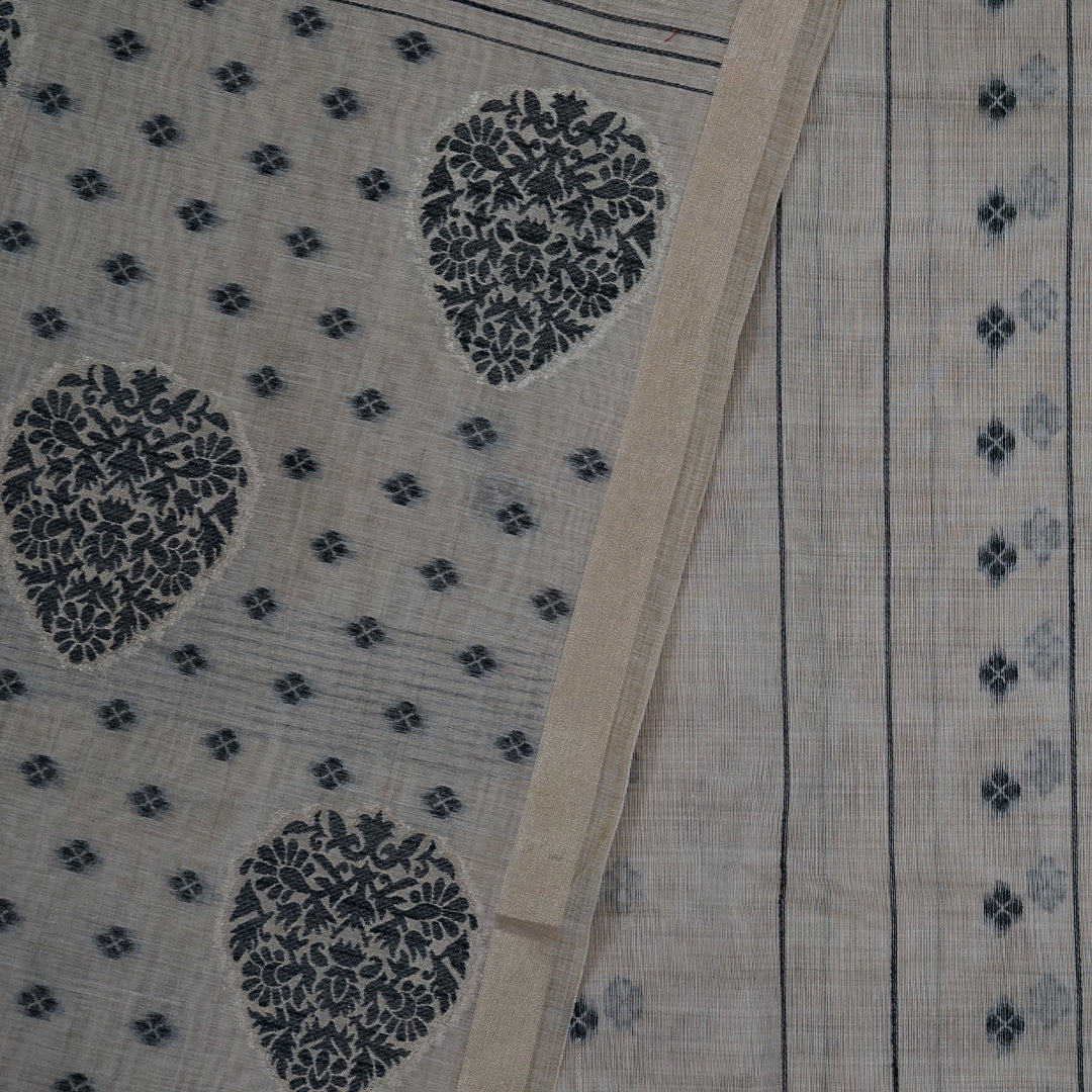 Beige Ishvani Tussar saree with black tassels