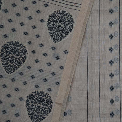 Beige Ishvani Tussar saree with black tassels