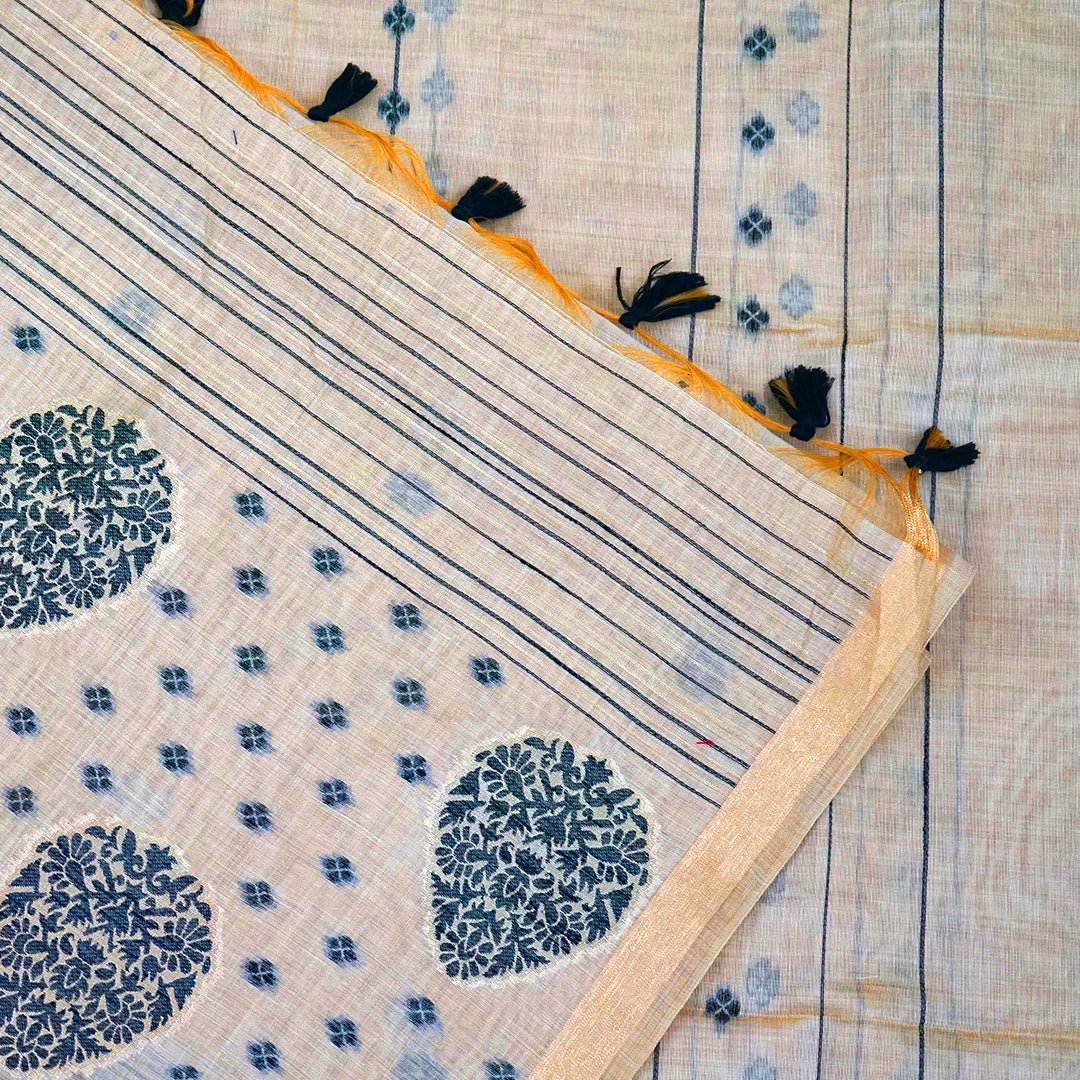 Beige Ishvani Tussar saree with black tassels