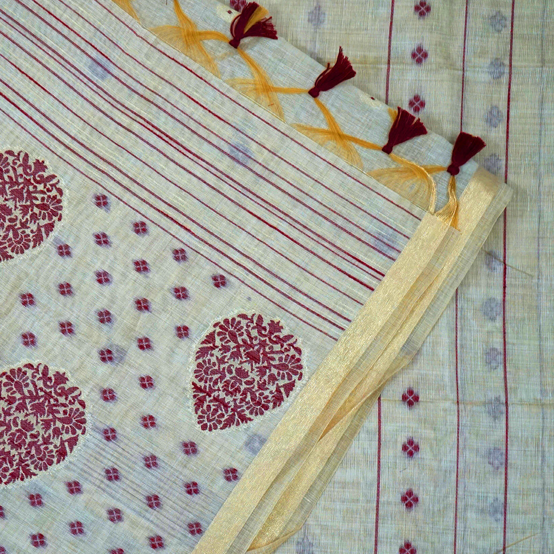 Beige Ishvani Tussar saree with Maroon tassels