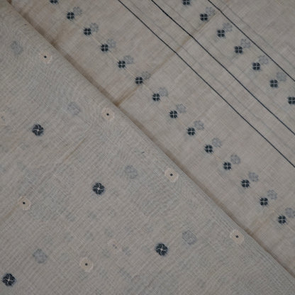 Beige Ishvani Tussar saree with black tassels