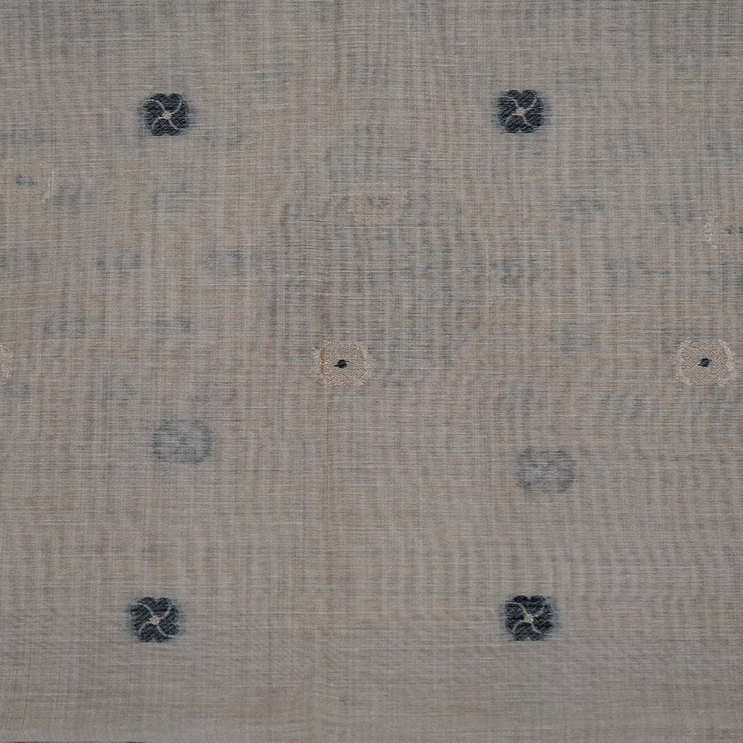 Beige Ishvani Tussar saree with black tassels